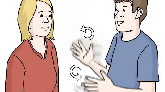 Zwei Menschen unterhalten sich mit Gebärden.